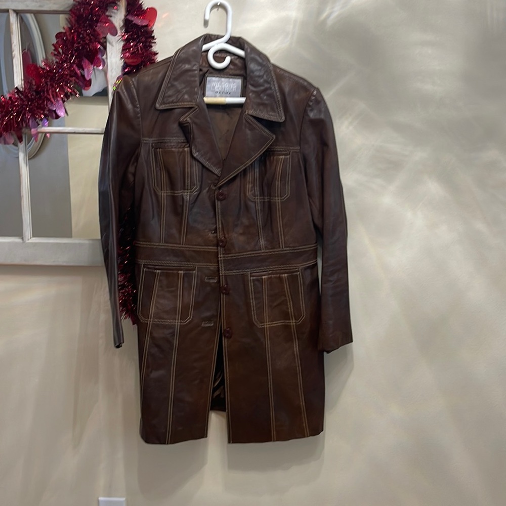Beautiful, brown leather coat with tan stitch detailing.